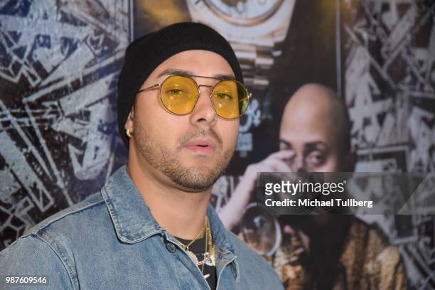 Music artist Osmar Escobar attends a release party for his EP "La Cultura" at Gibson Brand Showroom on June 29, 2018 in Beverly Hills, California.