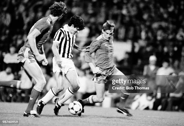 Paolo Rossi of Juventus moves between Kenny Dalglish and Gary Gillespie of Liverpool during the European Cup Final at Heysel Stadium, Brussels on...