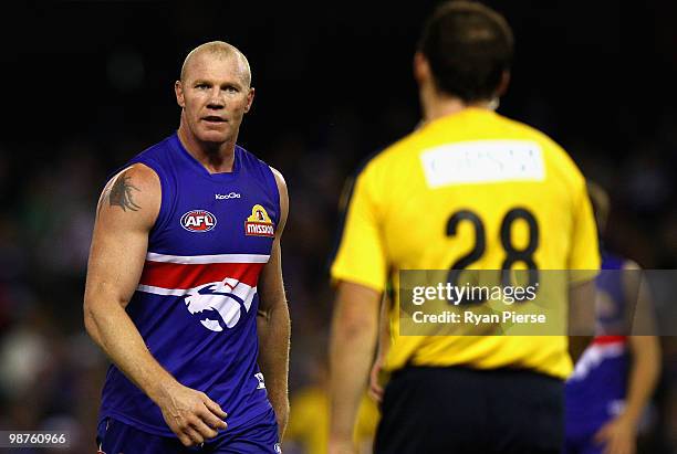 Barry Hall of the Bulldogs stares at upmpire Troy Pannell during the round six AFL match between the Western Bulldogs and the St Kilda Saints at...