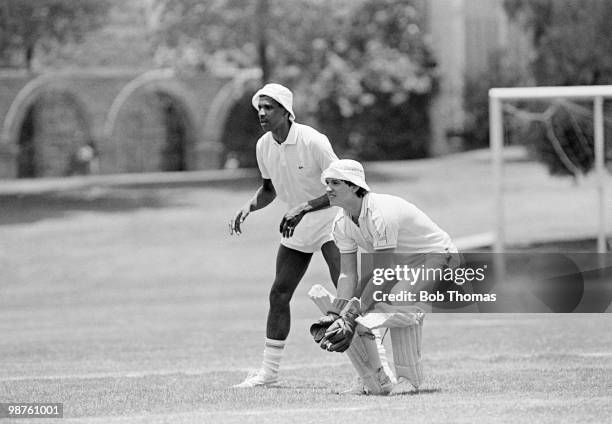 During the England Football Summer Tour, Viv Anderson and wicketkeeper Gary Lineker of England are pictured in action against the Mexico City Cricket...