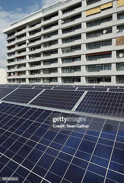 Solar cell panels stand on a rooftop next to an apartment building on April 30, 2010 in Berlin, Germany. Germany has invested heavily in solar and...