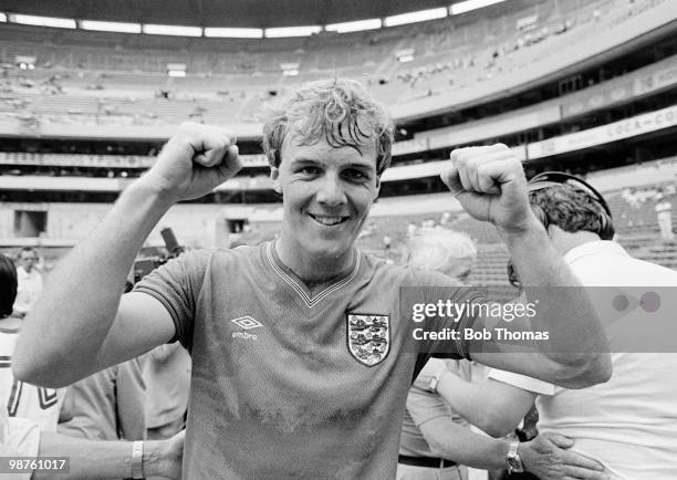 England striker Kerry Dixon celebrates after scoring two goals against West Germany in his first full international match held at the Aztec Stadium,...