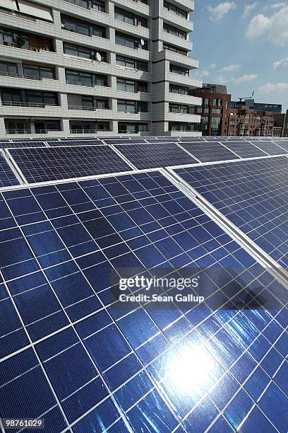 Solar cell panels stand on a rooftop next to an apartment building on April 30, 2010 in Berlin, Germany. Germany has invested heavily in solar and...