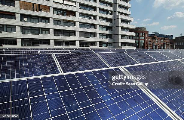 Solar cell panels stand on a rooftop next to an apartment building on April 30, 2010 in Berlin, Germany. Germany has invested heavily in solar and...