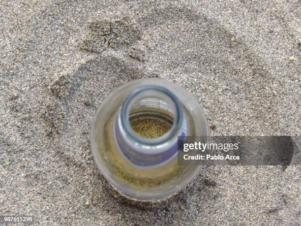 sand bottle - arce stock pictures, royalty-free photos & images