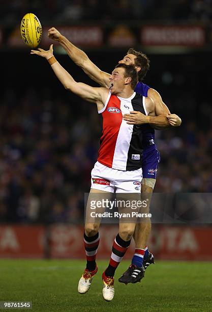 Justin Koschitzke of the Saints is spoiled by Dale Morris of the Bulldogs during the round six AFL match between the Western Bulldogs and the St...
