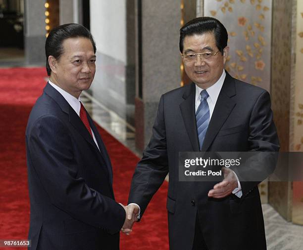 Chinese President Hu Jintao receives Vietnamese Prime Minister Nguyen Tan Dung on April 30, 2010 in Shanghai, China. The Presidents held talks which...