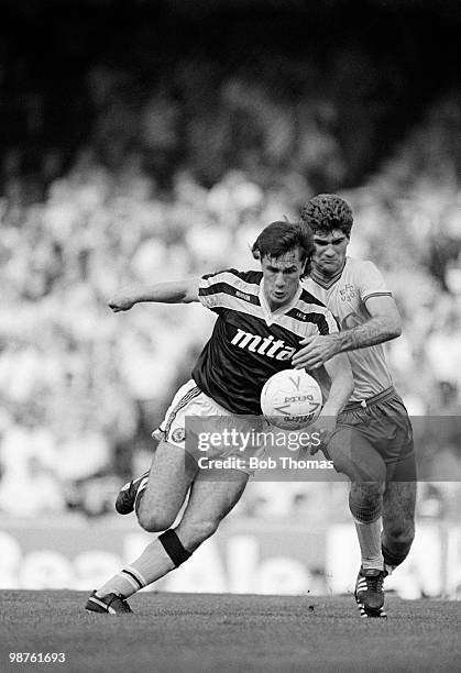 Aston Villa's new signing Simon Stainrod is challenged by Everton defender Ian Marshall during the Division One football match held at Villa Park,...