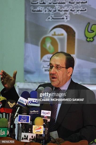 Iraqi Premier Nuri al-Maliki speaks during a meeting in the holy Shiite shrine city of Karbala, south of Baghdad, on April 30, 2010 to announce the...