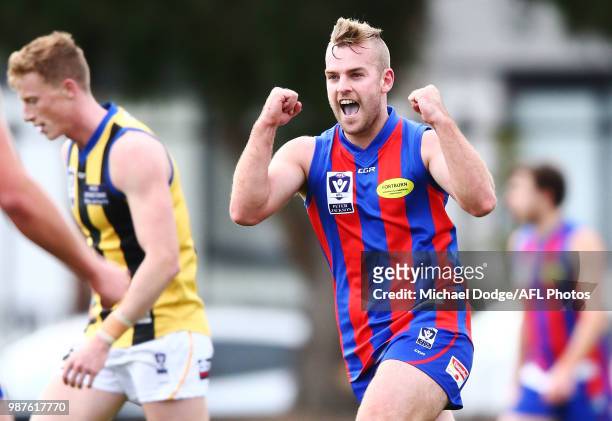 Blake Pearson of Port Melbourne celebrates a goal during the round 13 VFL match between Port Melbourne and Sandringham at North Port Oval on June 30,...