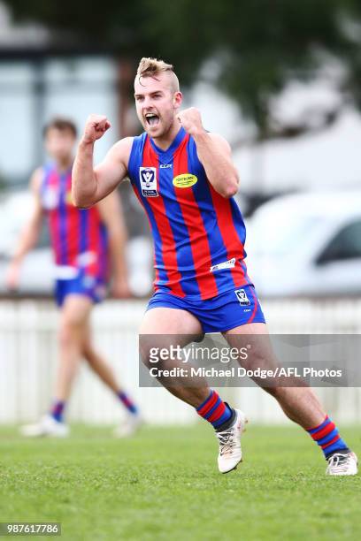 Blake Pearson of Port Melbourne celebrates a goal during the round 13 VFL match between Port Melbourne and Sandringham at North Port Oval on June 30,...