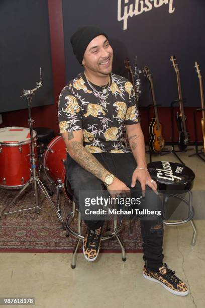 Music artist Osmar Escobar attends a release party for his EP "La Cultura" at Gibson Brand Showroom on June 29, 2018 in Beverly Hills, California.