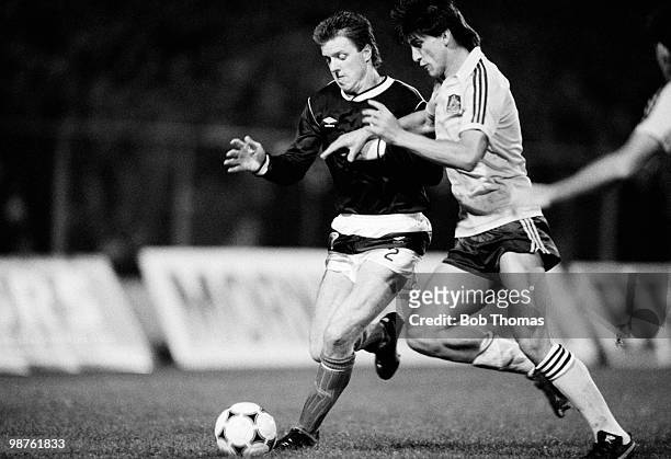 Steve Nicol of Scotland is challenged by Australian winger Oscar Crino during the World Cup Qualifying match held at Hampden Park, Glasgow on 20th...
