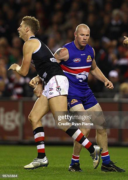 Barry Hall of the Bulldogs clashes with Zac Dawson of the Saints during the round six AFL match between the Western Bulldogs and the St Kilda Saints...