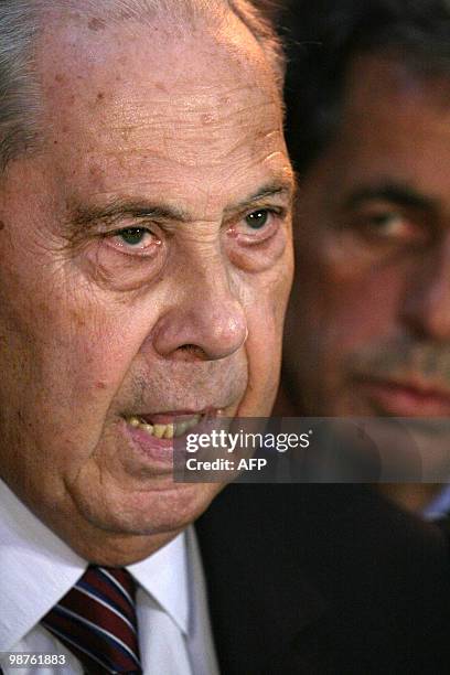 Former French Interior minister Charles Pasqua addresses journalists at the Paris courthouse on April 30 after he received one year suspended prison...