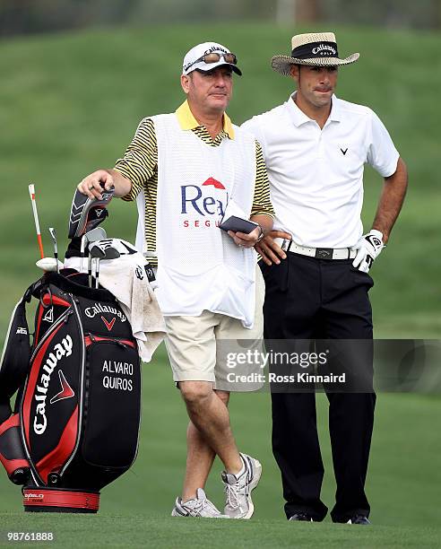 Alvaro Quiros of Spain and his caddie Alistair McLean during the second round of the Open de Espana at the Real Club de Golf de Seville on April 30,...