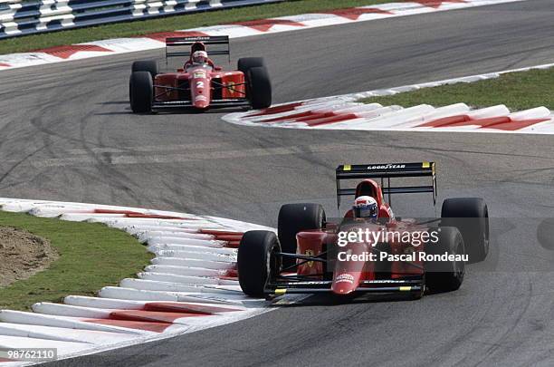 Alain Prost drives the Scuderia Ferrari 641 ahead of his team mate Nigel Mansell during the Italian Grand Prix on 9 September 1990 at the Autodromo...