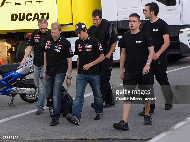 Marc Marquez of Spain and Red Bull AJo Motorsport walks with team in paddock at Circuito de Jerez on April 29, 2010 in Jerez de la Frontera, Spain.