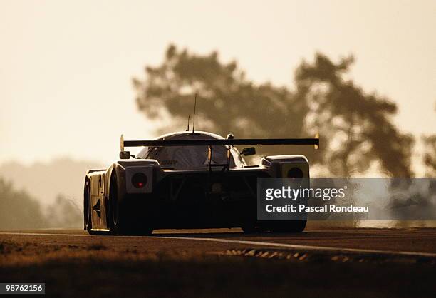 The Team Sauber Mercedes C9 driven by Jochen Mass , Manuel Reuter and Stanley Dickens greets the sunrise under the Dunlop Bridge on their way to...
