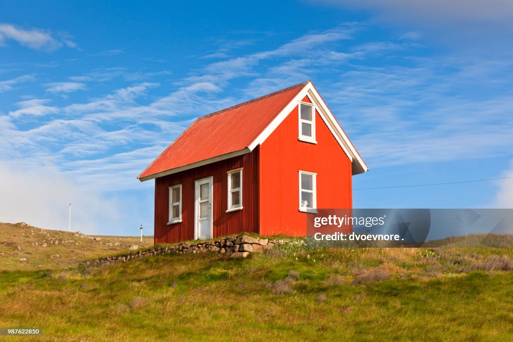 Bright Red Siding House in Iceland