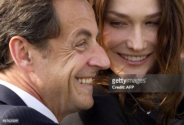 French President Nicolas Sarkozy and his wife Carla Bruni-Sarkozy, are seen in the French pavilion, during a visit at the Shanghai World Expo site in...