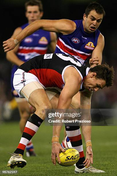 Justin Koschitzke of the Saints gathers the ball during the round six AFL match between the Western Bulldogs and the St Kilda Saints at Etihad...