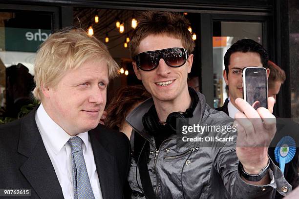 Boris Johnson , the Mayor of London poses for a picture with a fan, as he campaigns in Camden for the Conservative party on April 30, 2010 in London,...