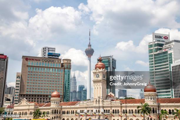 sultan abdul samad building with kuala lumpur office buildings - dataran merdeka stock pictures, royalty-free photos & images