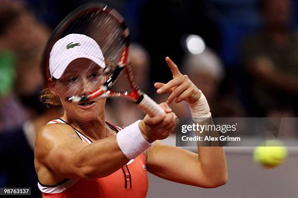 Samantha Stosur of Australia plays a forehand during her quarterfinal match against Na Li of China at day five of the WTA Porsche Tennis Grand Prix...