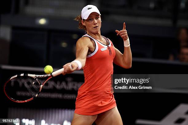 Samantha Stosur of Australia plays a forehand during her quarterfinal match against Na Li of China at day five of the WTA Porsche Tennis Grand Prix...