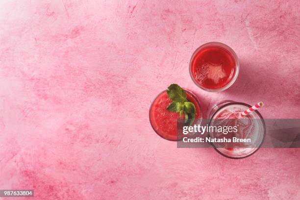 red fruit cocktails or smoothies - raspberry cocktail stock pictures, royalty-free photos & images