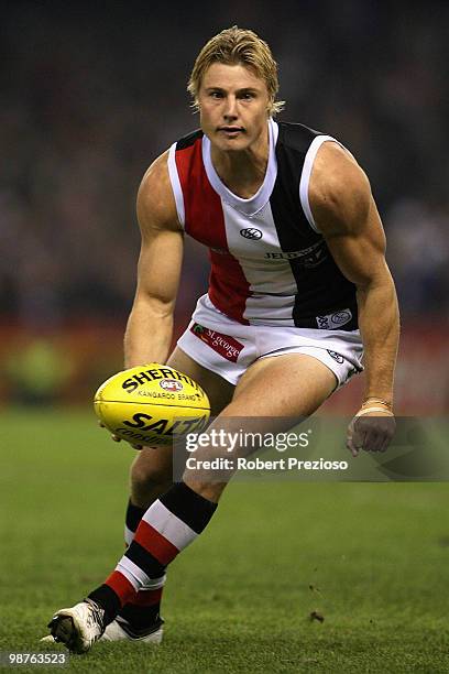 Clinton Jones of the Saints gathers the ball during the round six AFL match between the Western Bulldogs and the St Kilda Saints at Etihad Stadium on...