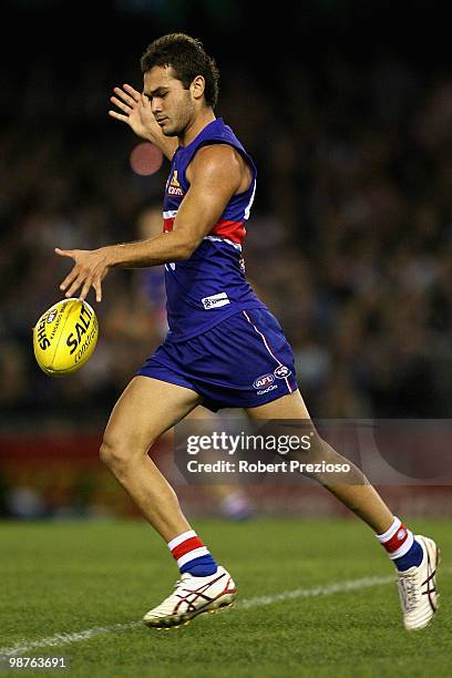 Jarrod Harbrow of the Bulldogs kicks the ball during the round six AFL match between the Western Bulldogs and the St Kilda Saints at Etihad Stadium...