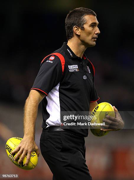 Stephen Silvagni assistant coach of the Saints helps players warm up during the round six AFL match between the Western Bulldogs and the St Kilda...