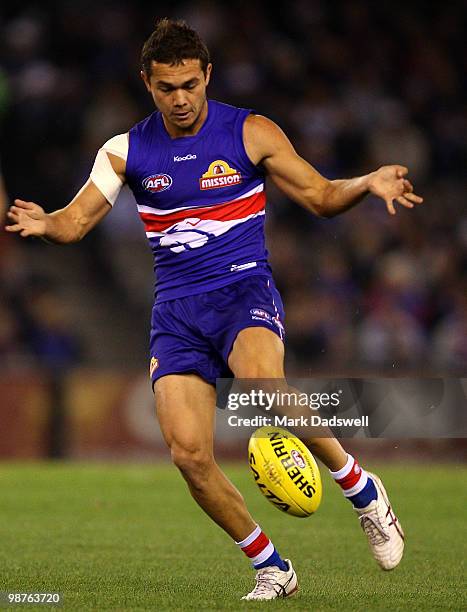 Jarrod Harbrow of the Bulldogs passes to a teammate during the round six AFL match between the Western Bulldogs and the St Kilda Saints at Etihad...