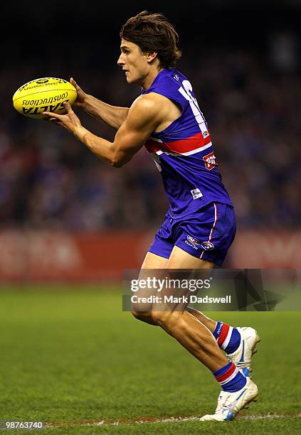 Ryan Griffen of the Bulldogs gathers the ball during the round six AFL match between the Western Bulldogs and the St Kilda Saints at Etihad Stadium...