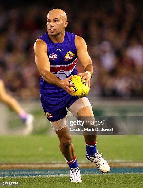 Nathan Eagleton of the Bulldogs looks for a teammate during the round six AFL match between the Western Bulldogs and the St Kilda Saints at Etihad...