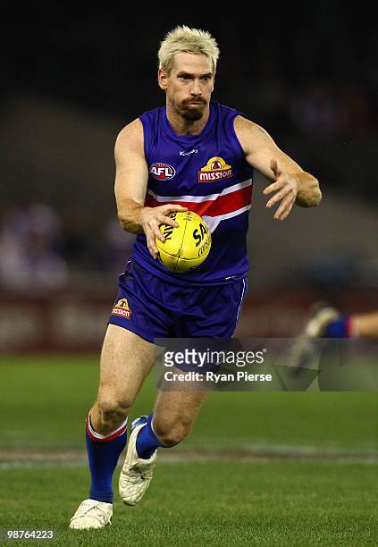 Jason Akermanis of the Bulldogs kicks during the round six AFL match between the Western Bulldogs and the St Kilda Saints at Etihad Stadium on April...
