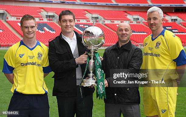 Jason Walker, Managers Dave Bayliss, Darren Sheridan and Paul Jones, Captain of Barrow AFC pose for a picture during the FA Trophy Media Day at...