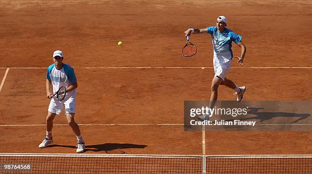 John Isner and Sam Querrey of USA in action in their doubles against Yves Allegro and Roger Federer of Switzerland during day six of the ATP Masters...