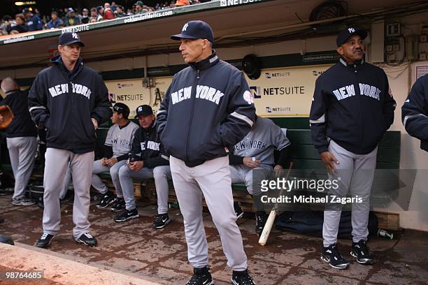 Manager Joe Girardi of the New York Yankees standing in the dugout prior to the game against the Oakland Athletics at the Oakland Coliseum on April...