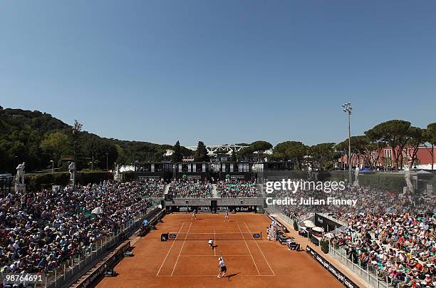 General view of John Isner and Sam Querrey of USA in action in their doubles against Yves Allegro and Roger Federer of Switzerland during day six of...