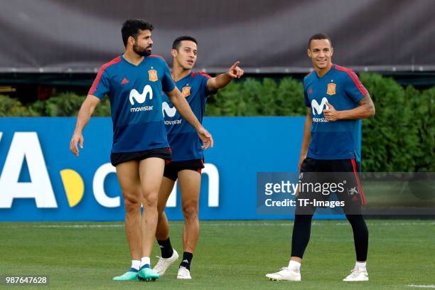 Diego Costa of Spain looks on and Thiago Alcantara of Spain gestures and Rodrigo Moreno of Spain laughs during a training session on June 27, 2018 in...