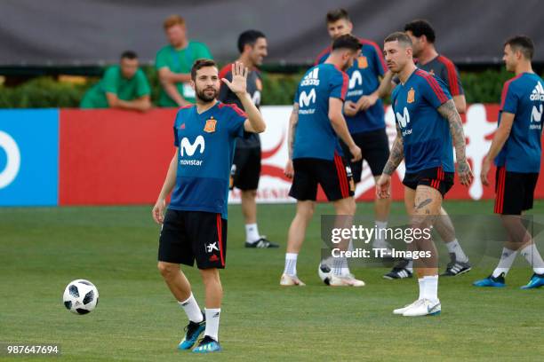 Jordi Alba of Spain gestures and Sergio Ramos of Spain looks on during a training session on June 27, 2018 in Krasnodar, Russia.