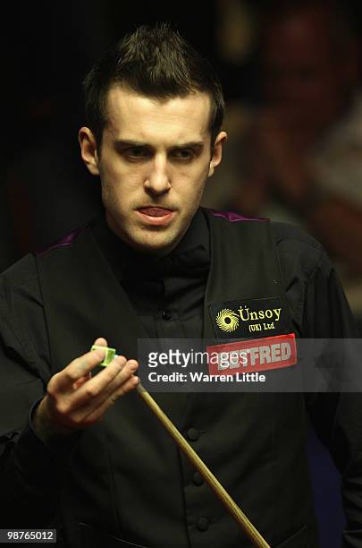 Mark Selby of England in action against Graeme Dott of Scotland during the semi final of the Betfred.com World Snooker Championships at The Crucible...