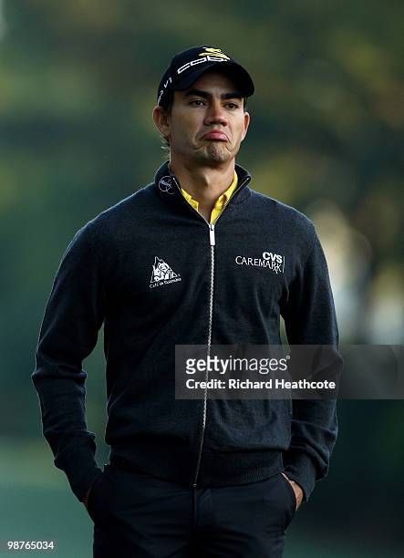 Camilo Villegas of Colombia waits to play into the 10th green during the second round of the Quail Hollow Championship at Quail Hollow Country Club...