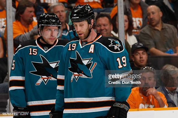 Dany Heatley and Joe Thornton of the San Jose Sharks look on against the Colorado Avalanche in Game Five of the Western Conference Quarterfinals...