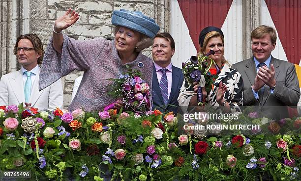 Dutch queen Beatrix -with Prince Bernhard Jr, Prince Constantijn, Princess Maxima, and Prince Willem Alexander in the background from Left- greats...