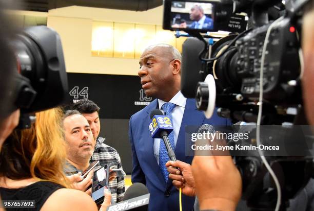 President of basketball operations Magic Johnson answers question from the media during a press conference to introduce the team's 2018 NBA draft...