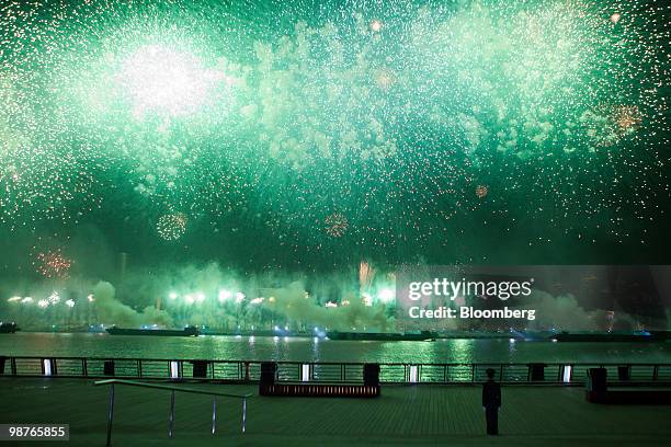 Fireworks explode over the Huangpu River during the opening ceremony of the 2010 World Expo in Shanghai, China, on Friday, April 30, 2010. More than...